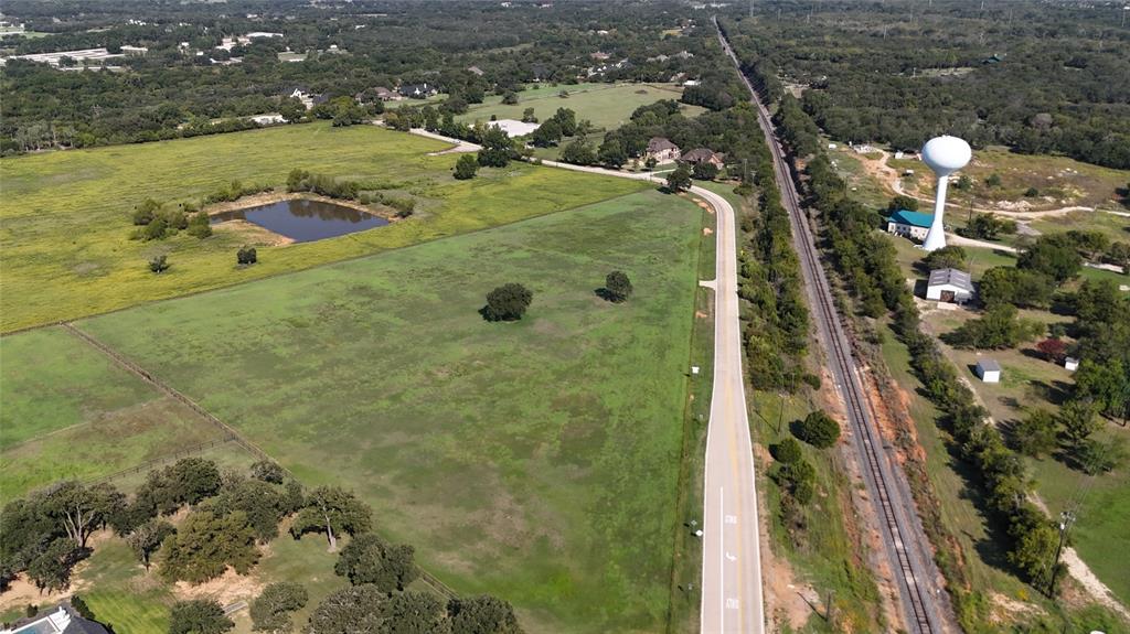 Lot 4 Hickory Hill Road Argyle, TX 76226 - Photo 4 of 11 an aerial view of a residential houses with outdoor space