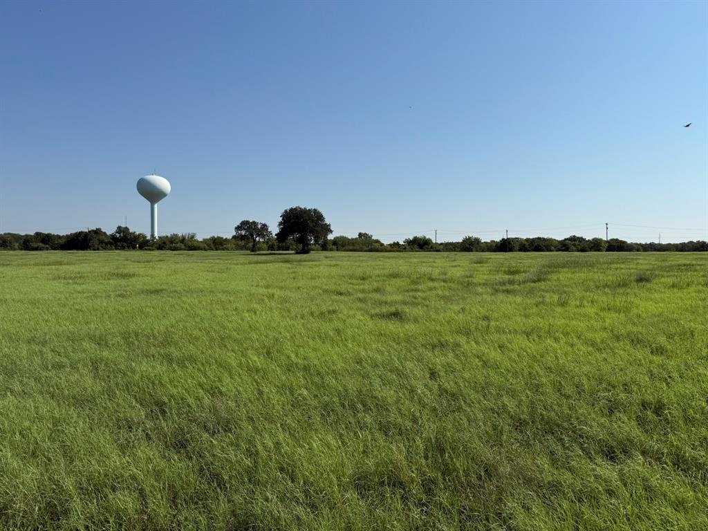Lot 4 Hickory Hill Road Argyle, TX 76226 - Photo 8 of 11 a view of a golf course with a lake