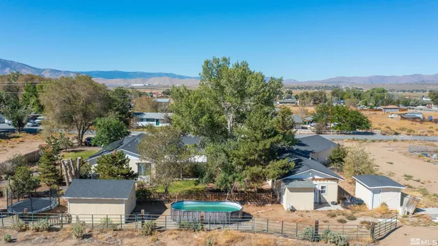 a view of city and mountain with a mountain view