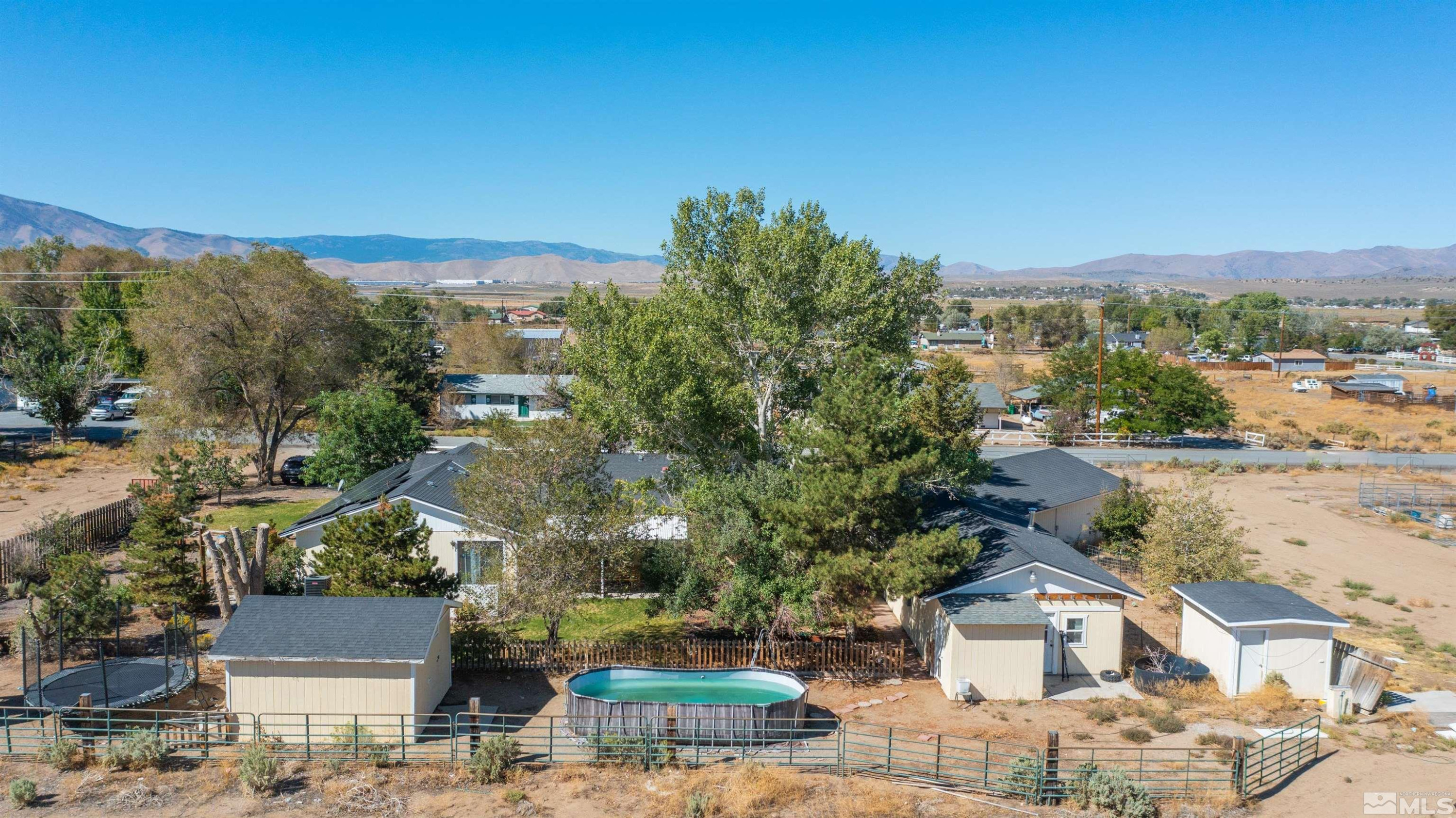 10880 Deodar Way Reno, NV 89506 - Photo 32 of 38 an aerial view of a house with a yard