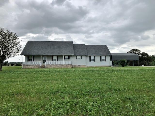 4074 Shady Grove Road Morrison, TN 37357 - Photo 1 of 29 a view of a house with a big yard and large trees