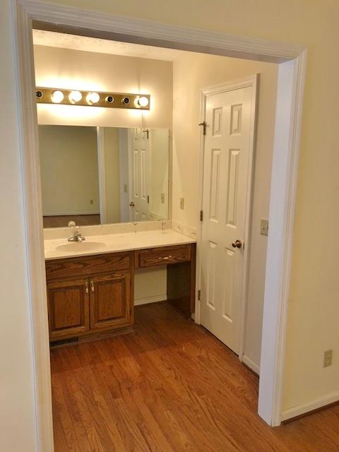 4074 Shady Grove Road Morrison, TN 37357 - Photo 15 of 29 a bathroom with a double vanity sink and mirror
