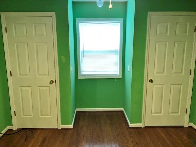 4074 Shady Grove Road Morrison, TN 37357 - Photo 19 of 29 an empty room with wooden floor and closet area