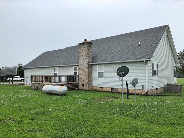 4074 Shady Grove Road Morrison, TN 37357 - Photo 23 of 29 a front view of house with a garden and swing