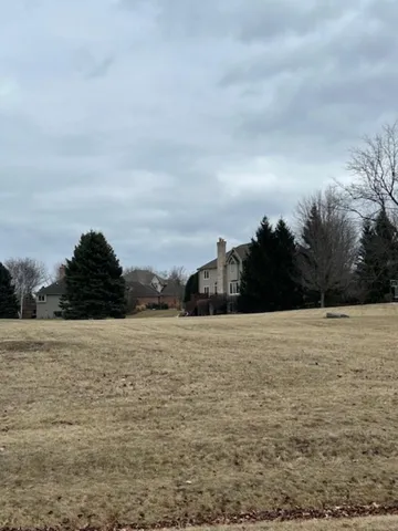 a view of an ocean of beach and sunset