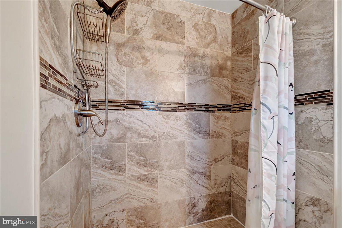 3854 Terka Circle Randallstown, MD 21133 - Photo 11 of 19 a bathroom with a shower