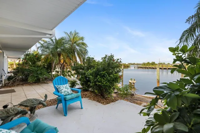 a view of a hallway with paintings on the wall