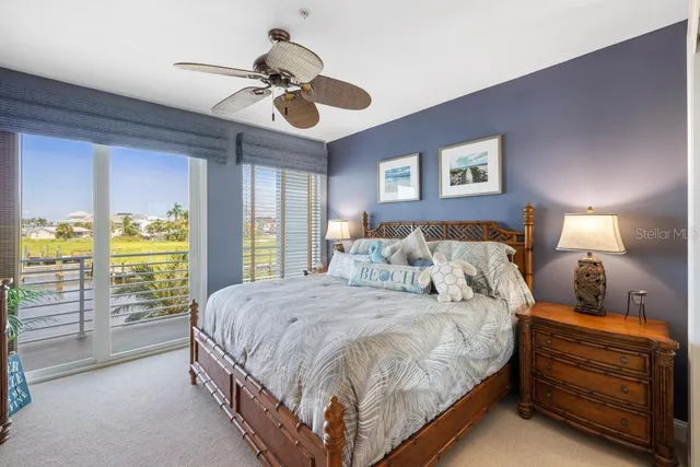 a view of a chairs and table in a balcony