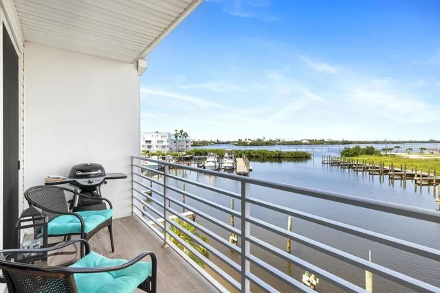 a view of a chairs and table in the terrace