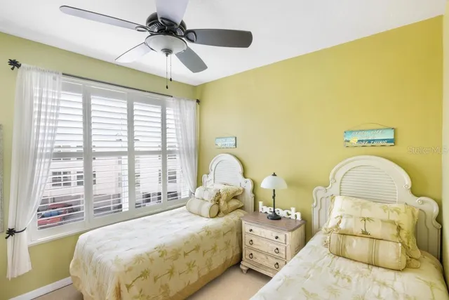 front view of a building with a garden