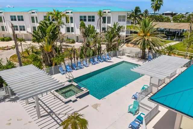 a view of a house with outdoor space and sitting area