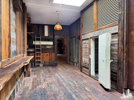 a view of dinning room and wooden floor in a room