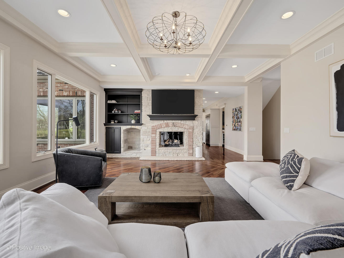 1129 Summit Hills Lane Naperville, IL 60563 - Photo 11 of 72 a living room with furniture and a flat screen tv