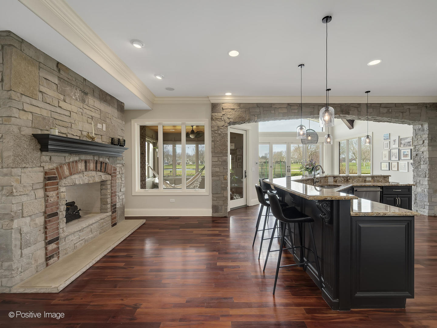 1129 Summit Hills Lane Naperville, IL 60563 - Photo 14 of 72 a kitchen with stainless steel appliances granite countertop a stove a refrigerator a oven and a wooden floor