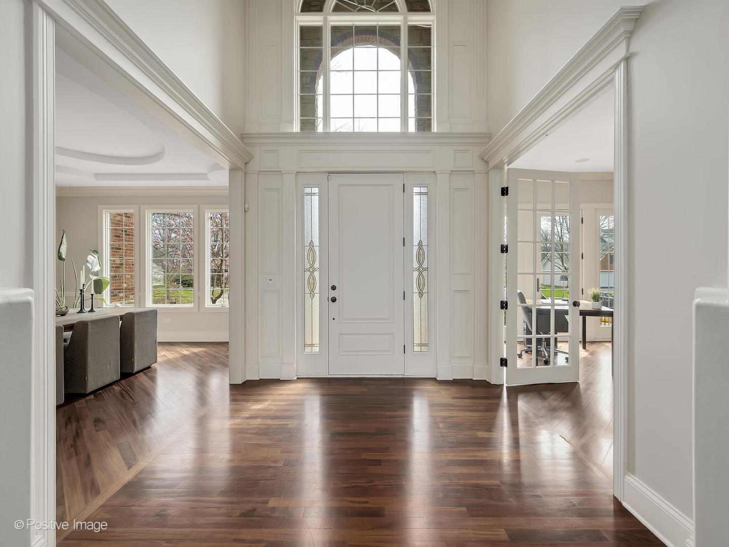 1129 Summit Hills Lane Naperville, IL 60563 - Photo 2 of 72 a view of livingroom with hardwood floor and kitchen view
