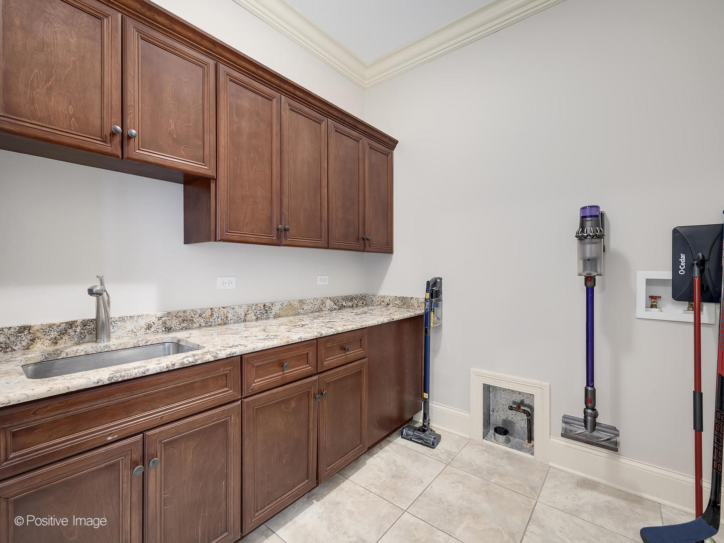 1129 Summit Hills Lane Naperville, IL 60563 - Photo 26 of 72 a kitchen with stainless steel appliances granite countertop a sink and cabinets