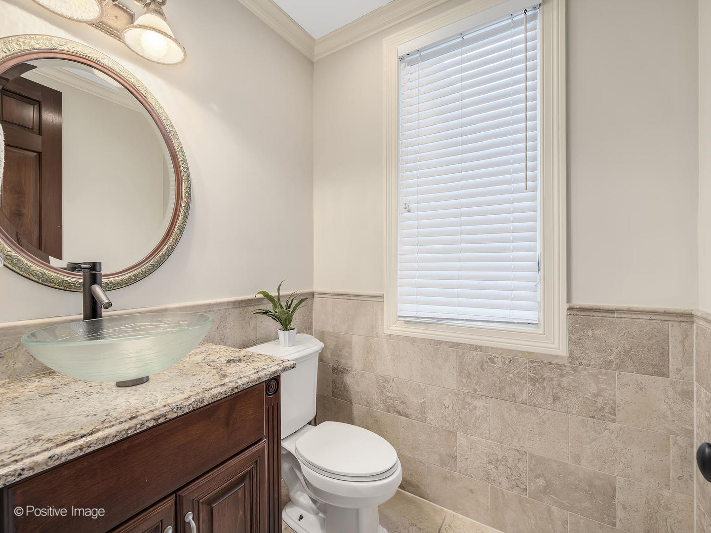 1129 Summit Hills Lane Naperville, IL 60563 - Photo 27 of 72 a bathroom with a granite countertop sink a toilet and a mirror
