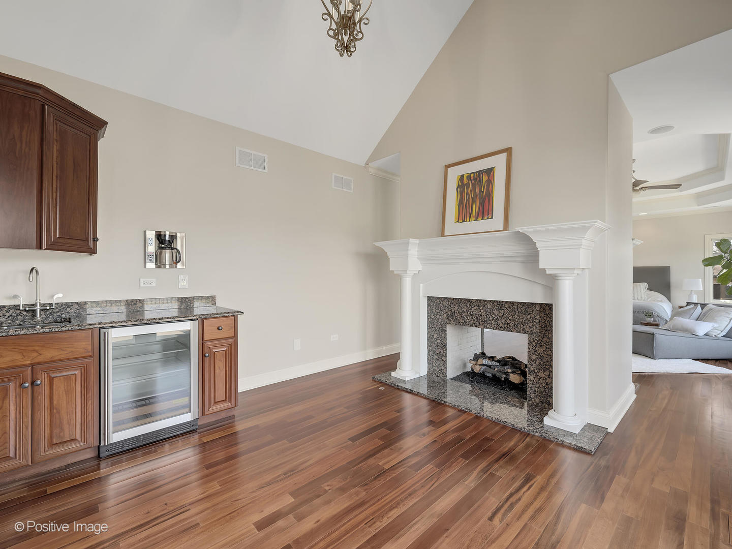 1129 Summit Hills Lane Naperville, IL 60563 - Photo 33 of 72 a living room with furniture and a fireplace