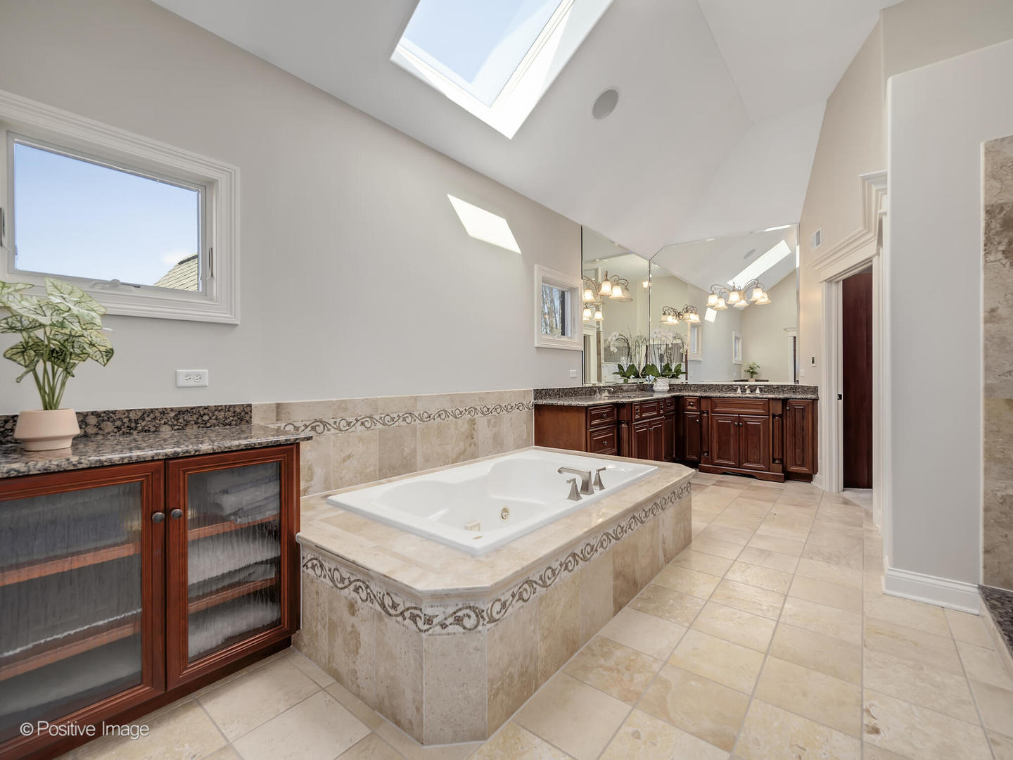 1129 Summit Hills Lane Naperville, IL 60563 - Photo 35 of 72 a bathroom with a tub sink and mirror