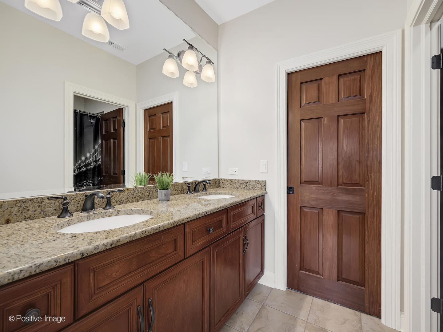1129 Summit Hills Lane Naperville, IL 60563 - Photo 44 of 72 a bathroom with a granite countertop double vanity sink and a mirror