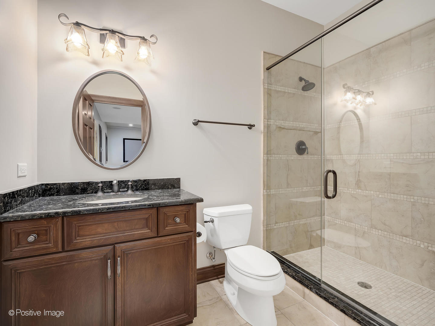 1129 Summit Hills Lane Naperville, IL 60563 - Photo 54 of 72 a bathroom with a toilet a sink and a mirror