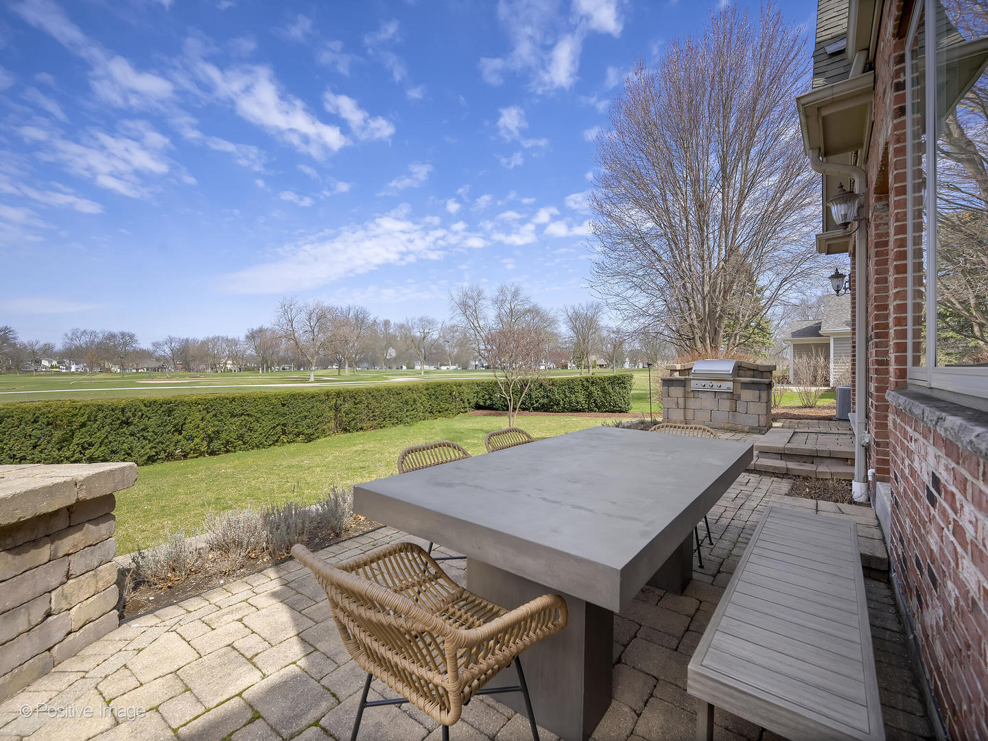 1129 Summit Hills Lane Naperville, IL 60563 - Photo 58 of 72 a view of a patio with table and chairs with wooden floor and fence