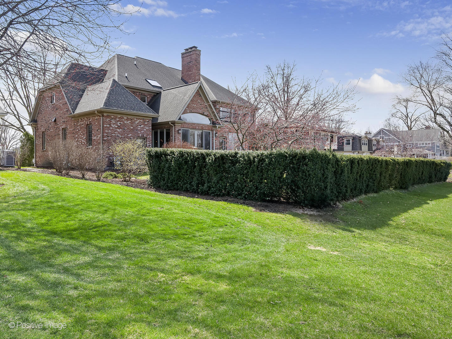 1129 Summit Hills Lane Naperville, IL 60563 - Photo 60 of 72 a front view of a house with garden