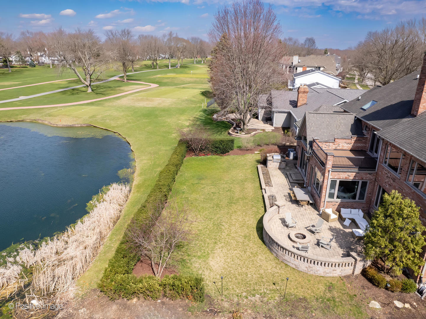 1129 Summit Hills Lane Naperville, IL 60563 - Photo 65 of 72 a view of a swimming pool with a yard