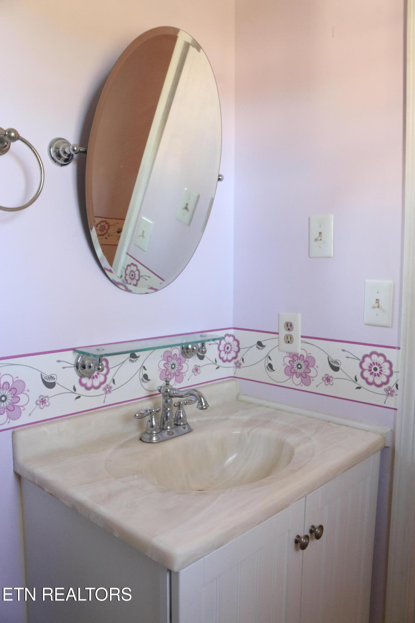 153 Vanderview Drive Seymour, TN 37865 - Photo 14 of 22 a close view of a sink and a mirror
