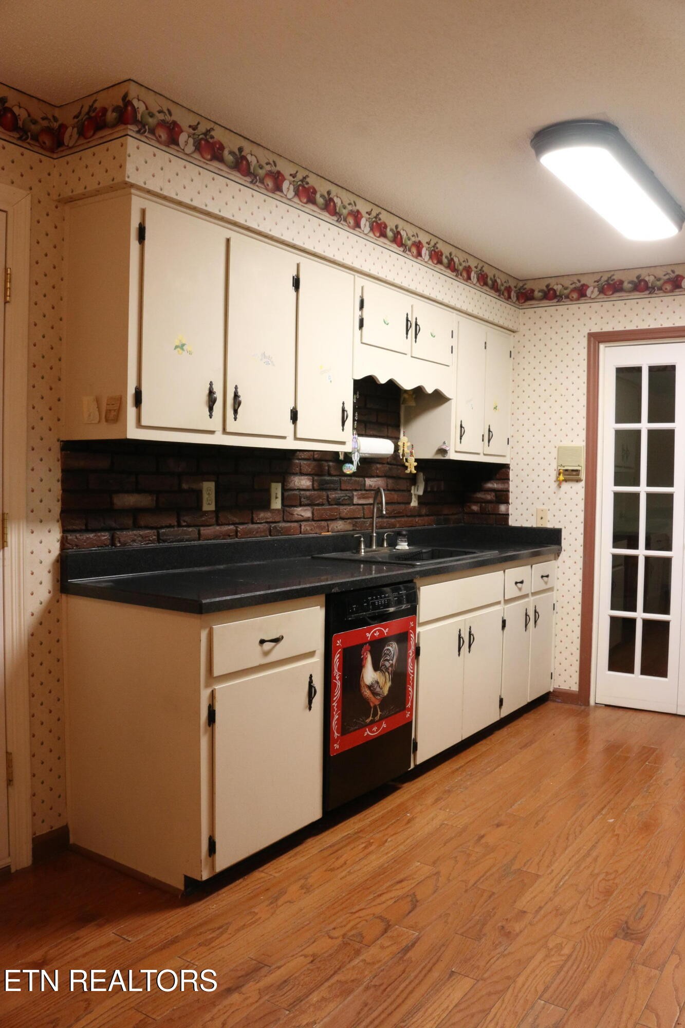 153 Vanderview Drive Seymour, TN 37865 - Photo 3 of 22 a view of a kitchen with stainless steel appliances granite countertop a stove and a white cabinets