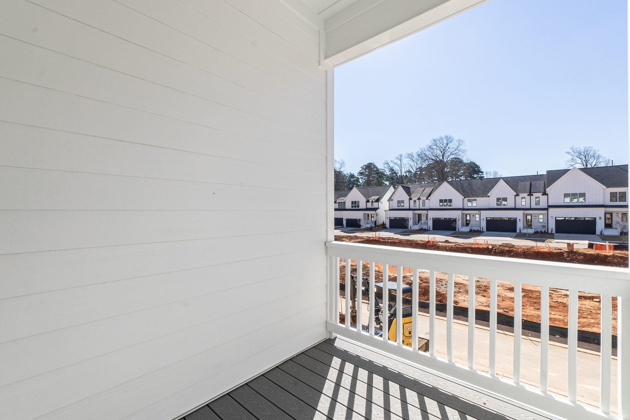 4916 Trek Lane Raleigh, NC 27606 - Photo 17 of 28 a view of a balcony with wooden floor