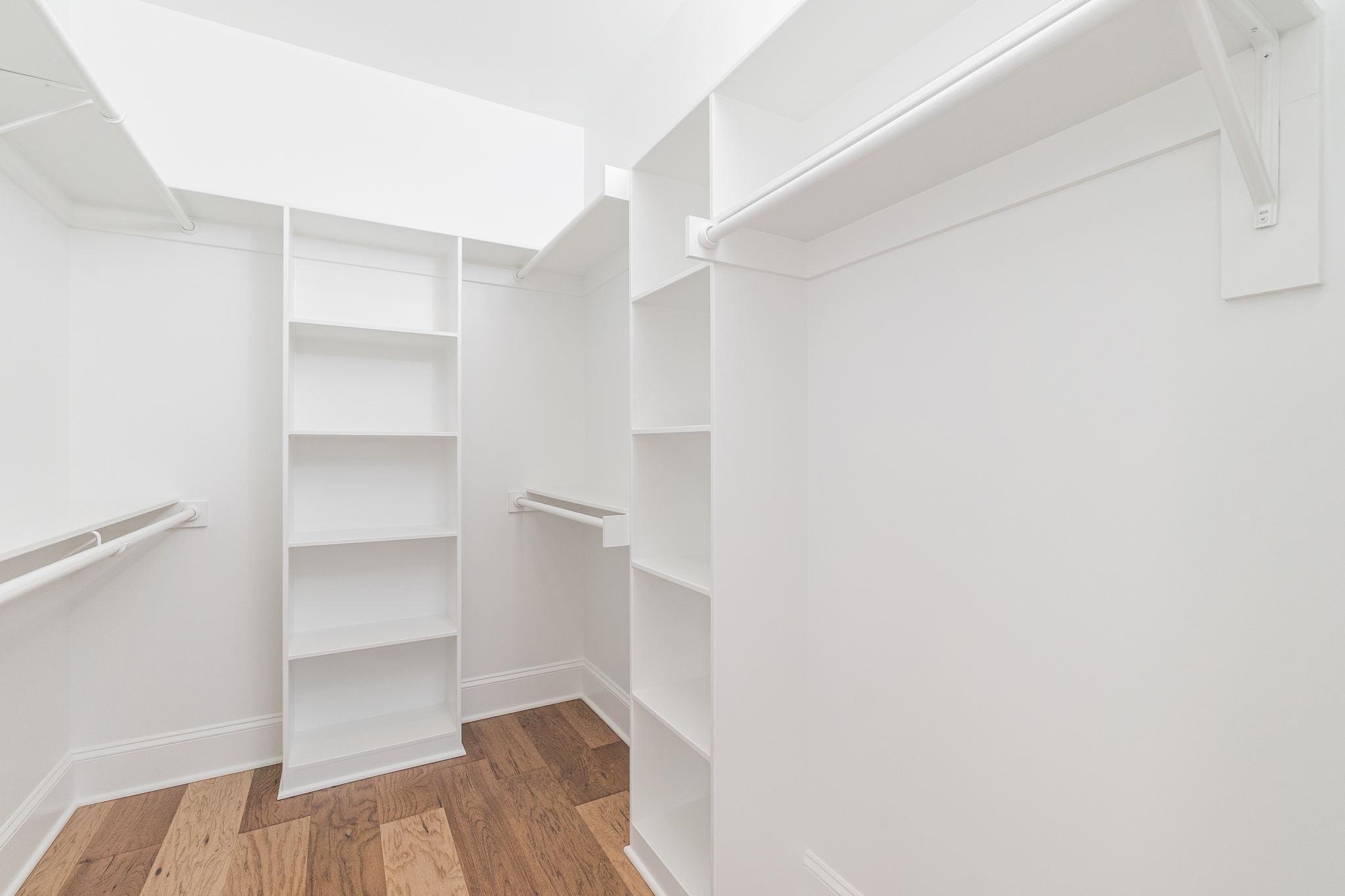 4916 Trek Lane Raleigh, NC 27606 - Photo 20 of 28 a view of walk in closet with empty racks