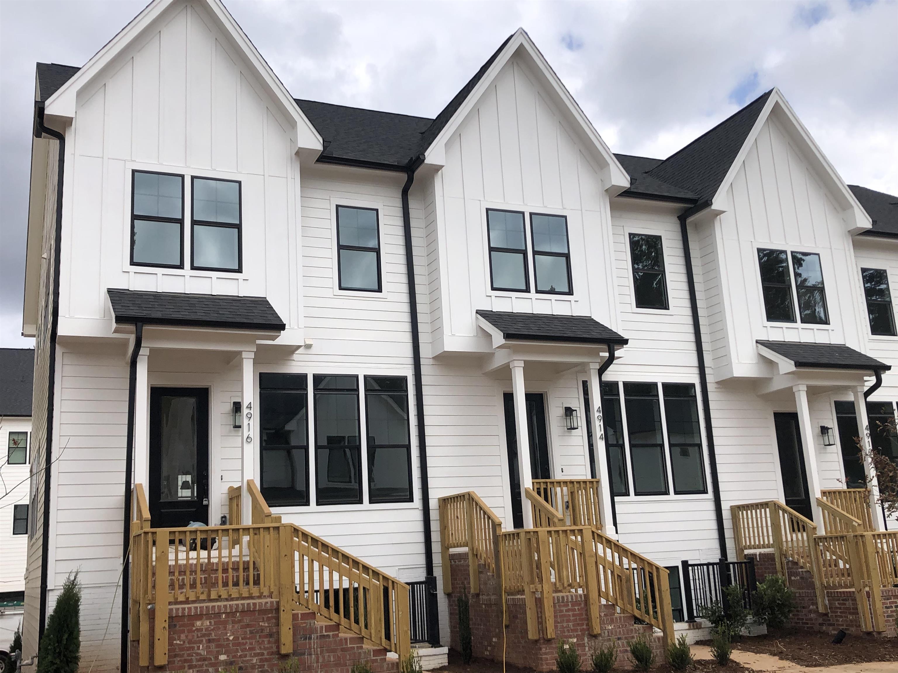 4916 Trek Lane Raleigh, NC 27606 - Photo 2 of 28 a front view of a house with a yard
