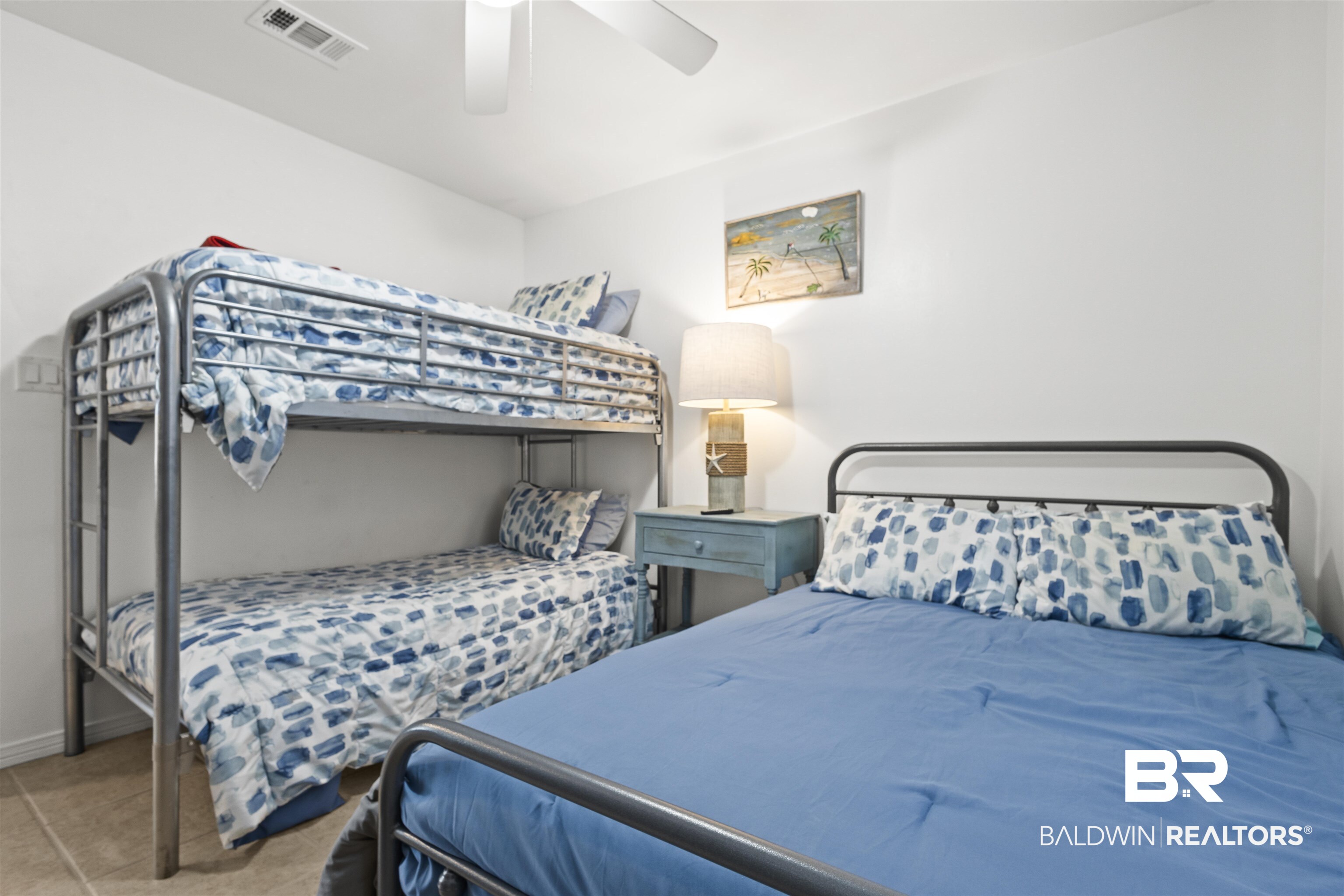 25925 Canal Road, Unit 207 Orange Beach, AL 36561 - Photo 22 of 42 Carpeted bedroom with ceiling fan