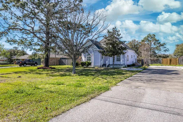 a view of a house with swimming pool