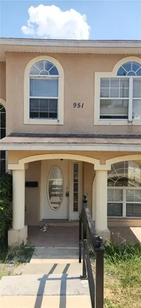 a front view of a house with parking