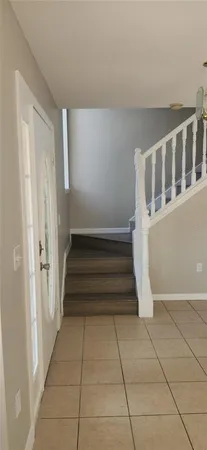 a view of entryway with a front door
