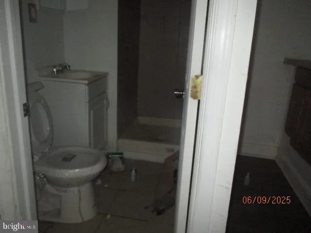 a bathroom with a sink and toilet