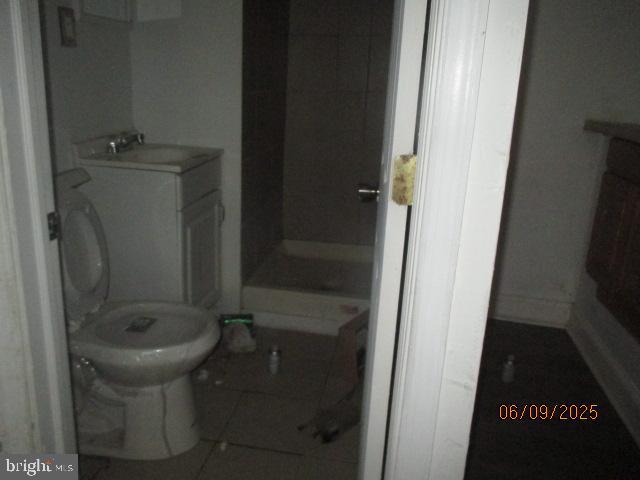 1142 West Nevada Street Philadelphia, PA 19133 - Photo 15 of 16 a bathroom with a sink and toilet