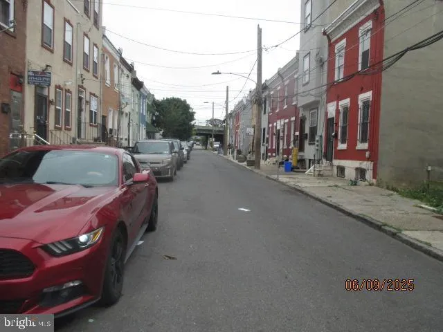 a cars parked on the side of street