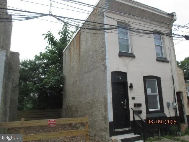a front view of a house with shower