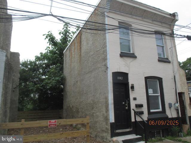 1142 West Nevada Street Philadelphia, PA 19133 - Photo 4 of 16 a front view of a house with shower