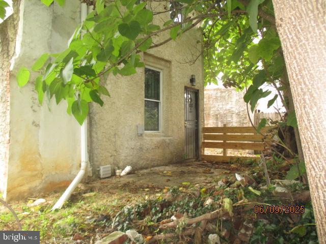 1142 West Nevada Street Philadelphia, PA 19133 - Photo 7 of 16 a view of a house with a tree