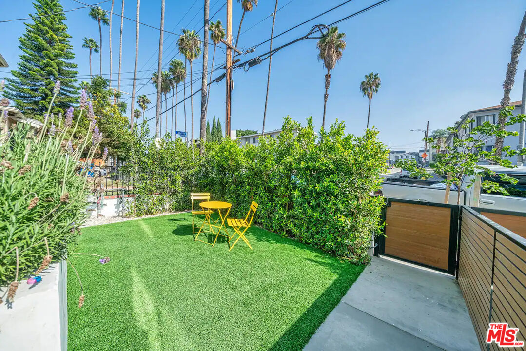 201 South Westlake Avenue, Unit 203 1/2 Los Angeles, CA 90057 - Photo 2 of 27 a view of a chair and table in the garden
