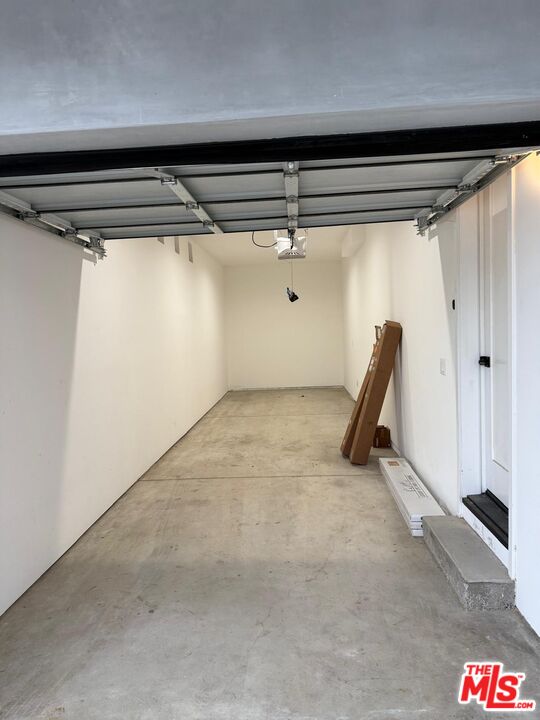 201 South Westlake Avenue, Unit 203 1/2 Los Angeles, CA 90057 - Photo 26 of 27 a view of a room with racks on the wall