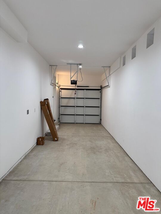 201 South Westlake Avenue, Unit 203 1/2 Los Angeles, CA 90057 - Photo 27 of 27 a view of room with stairs and mirrors