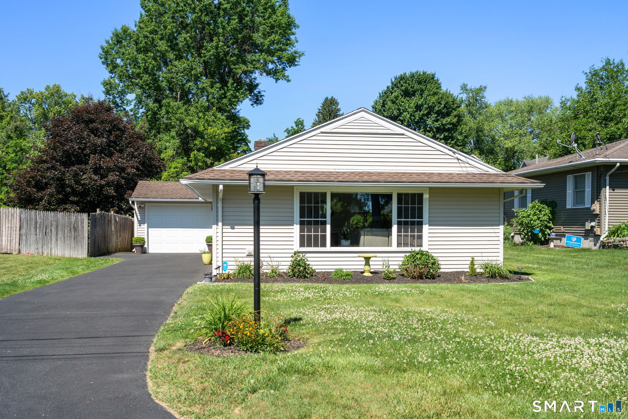 31 Cowan Street Suffield, CT 06078 - Photo 2 of 29 front view of a house with a yard