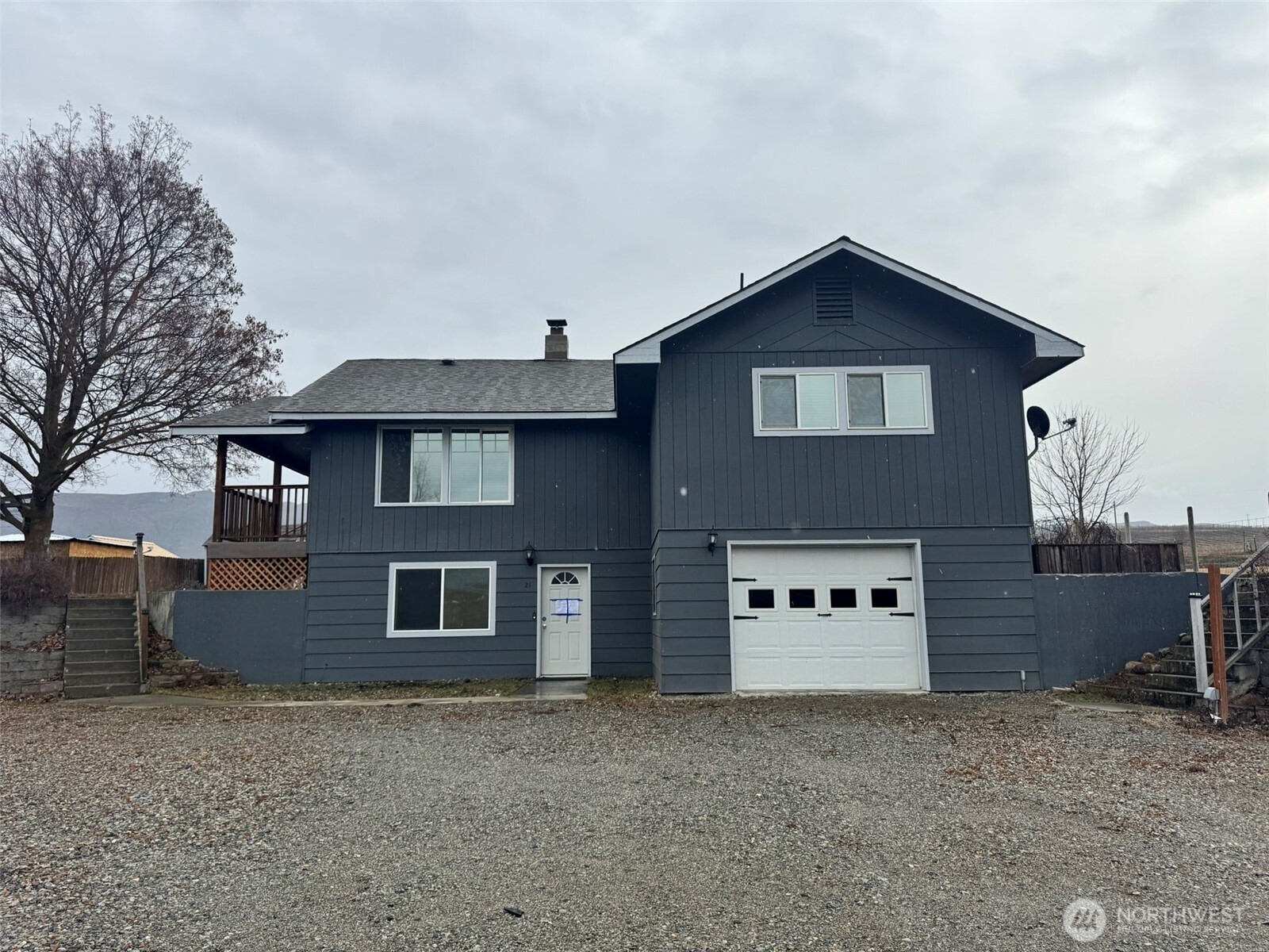 21 Orchard Loop North Tonasket, WA 98855 - Photo 1 of 23 a view of a house with a yard