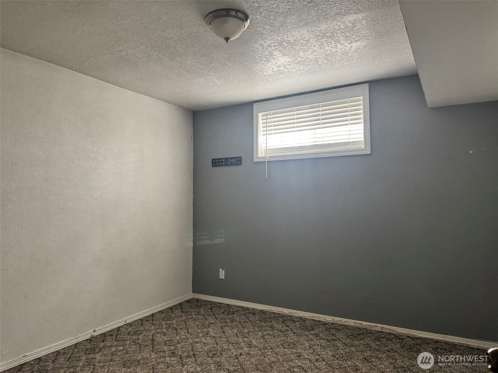 21 Orchard Loop North Tonasket, WA 98855 - Photo 13 of 23 an empty room with windows