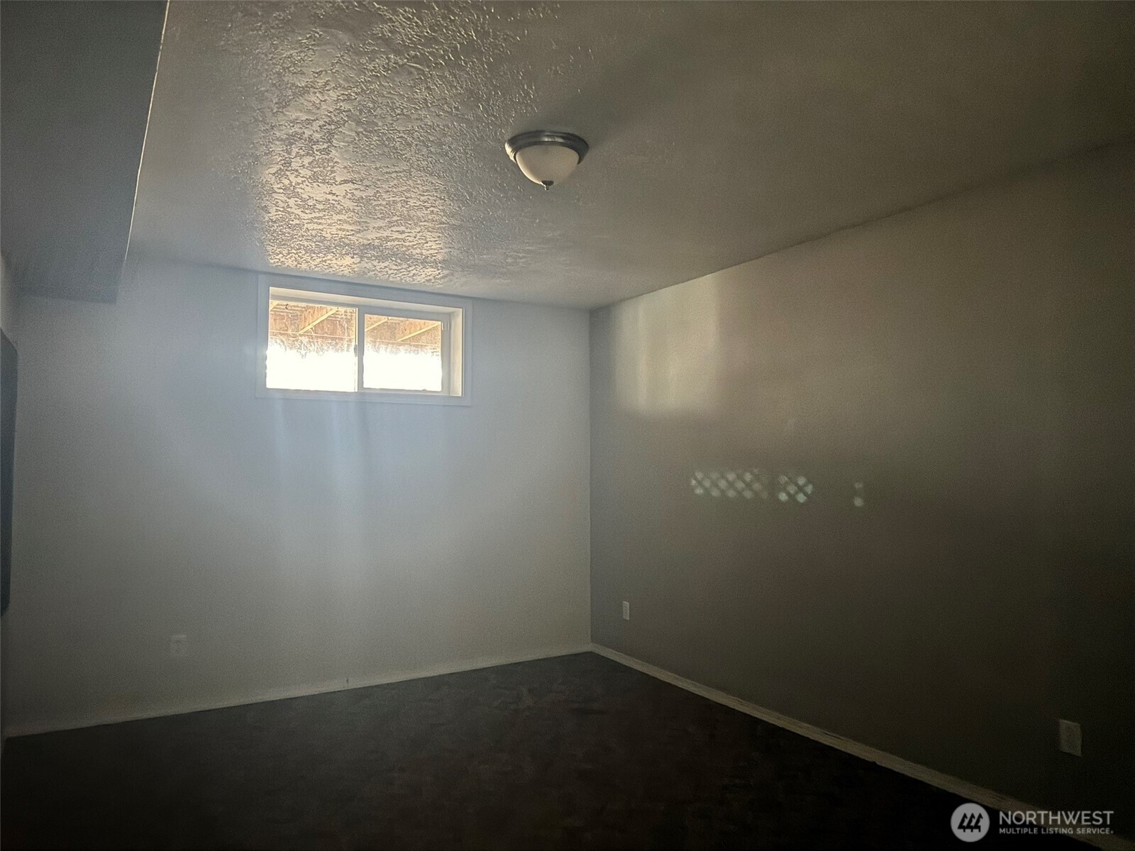 21 Orchard Loop North Tonasket, WA 98855 - Photo 14 of 23 an empty room with windows